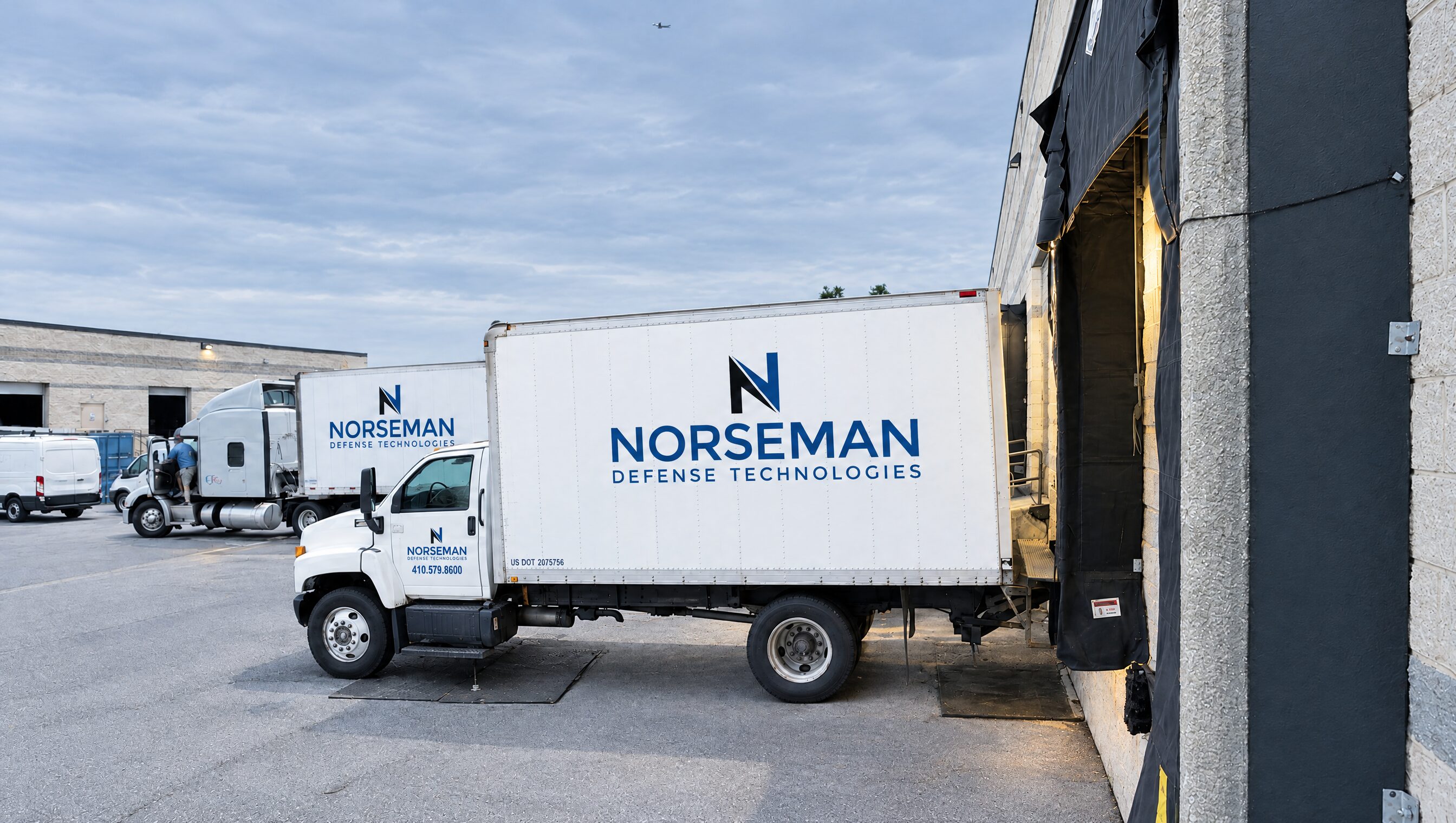Norseman box trucks at the loading dock of the Annapolis Junction logistics center